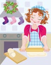 A child at Christmas in Advent when baking cookies Royalty Free Stock Photo