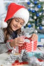 Child with Christmas present