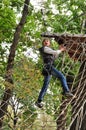 Child in a climbing adventure activity park Royalty Free Stock Photo