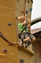 Child climbing down wall Royalty Free Stock Photo