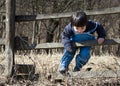 Child climbing the fence Royalty Free Stock Photo