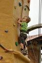 Child climbing wall Royalty Free Stock Photo