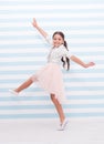 Child concept. Happy little child dancing. Child girl smile in fashion dress. Child and childhood. sense of freedom Royalty Free Stock Photo