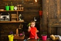 Child concept. Little child with gardening tools. Cute child in garden shed. Happy child gardener Royalty Free Stock Photo