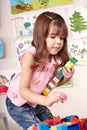 Child with construction set playing. Royalty Free Stock Photo