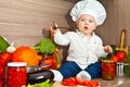 The child the cook cooks food Royalty Free Stock Photo