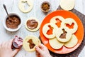 Child cooking Easter cookies funny bunny