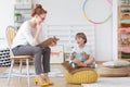 Child counselor during psychotherapy session Royalty Free Stock Photo