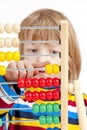 Child Counting on Colorful Wooden Abacus