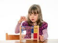 Child counts with abacus