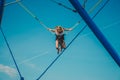 Child with courage jumping high up to the skies Royalty Free Stock Photo