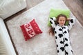 Child in cow print pajamas Royalty Free Stock Photo