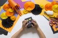 The child creates a gift box of a black cat. A party for Halloween.