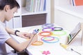 Child creating new 3D object with 3d pen. Learning, technology, STEM education, leisure, creative entertainment at home Royalty Free Stock Photo