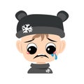 Child with crying and tears emotion, sad face, depressive eyes in bear hat with snowflake