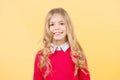 Child with curly blond hair in red sweater Royalty Free Stock Photo