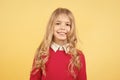 Child with curly blond hair in red sweater Royalty Free Stock Photo