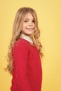 Child with curly blond hair in red sweater Royalty Free Stock Photo