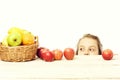 Child, cute baby happy girl with colorful fruits in basket Royalty Free Stock Photo