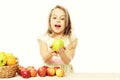 Child, cute baby happy girl with colorful fruits in basket Royalty Free Stock Photo