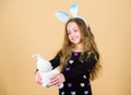 Child cute bunny costume. Kid hold tender soft rabbit toy. Easter day coming. Celebrate easter. Happy childhood. Easter