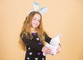 Child cute bunny costume. Kid hold tender soft rabbit toy. Easter day coming. Celebrate easter. Happy childhood. Easter