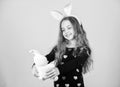 Child cute bunny costume. Kid hold tender soft rabbit toy. Easter day coming. Celebrate easter. Happy childhood. Easter