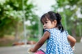 Child cute little girl riding bike Royalty Free Stock Photo