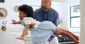 Child, dad and happy with airplane game in kitchen, freedom and fun with love bonding in home. Black family, playing and Royalty Free Stock Photo