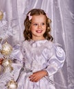 Child decorate Christmas tree. Xmas holiday. Royalty Free Stock Photo