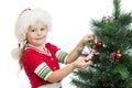 Child decorating Christmas tree isolated Royalty Free Stock Photo