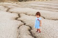 Child in a desert land