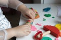 Child development and children& x27;s creativity. The child is engaged in modeling plasticine. Royalty Free Stock Photo