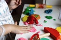 Child development and children& x27;s creativity. The child is engaged in modeling plasticine. Royalty Free Stock Photo