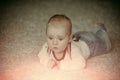 Child development concept. Infant crawl on floor carpet Royalty Free Stock Photo