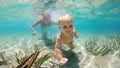 Child dive underwater in blue sea lagoon Royalty Free Stock Photo