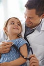 Child, doctor and stethoscope of pediatrician for healthcare consulting, check lungs and listening to heartbeat. Happy Royalty Free Stock Photo