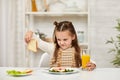 The child does not want to have breakfast. Royalty Free Stock Photo