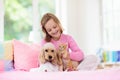 Child, dog and cat. Kids play with puppy, kitten Royalty Free Stock Photo