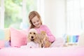 Child, dog and cat. Kids play with puppy, kitten Royalty Free Stock Photo