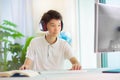 Child doing homework on computer. Online class Royalty Free Stock Photo