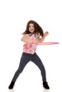 Child doing hula hoop with motion blur