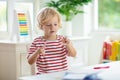 Child doing school homework. Online learning Royalty Free Stock Photo