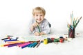 Child drawing with brush in album Royalty Free Stock Photo