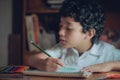 Child drawing in classes at the entrance to classes in 2021