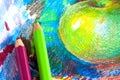 Child drawing by colored pencils Royalty Free Stock Photo