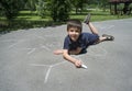 Child drawing family on asphalt Royalty Free Stock Photo