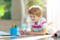 Child drawing. Kid painting rainbow Royalty Free Stock Photo