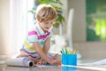 Child drawing. Kid painting rainbow Royalty Free Stock Photo