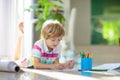 Child drawing. Kid painting rainbow Royalty Free Stock Photo